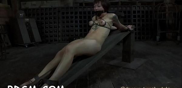  Restrained girl is made to suffer underneath hard toy playing